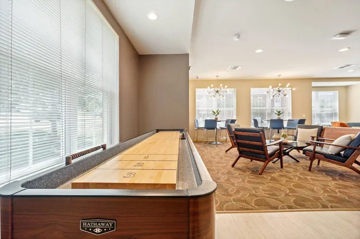 Community clubhouse at Elan Apartments in Fitchburg, Wisconsin featuring shared indoor amenities for residents.