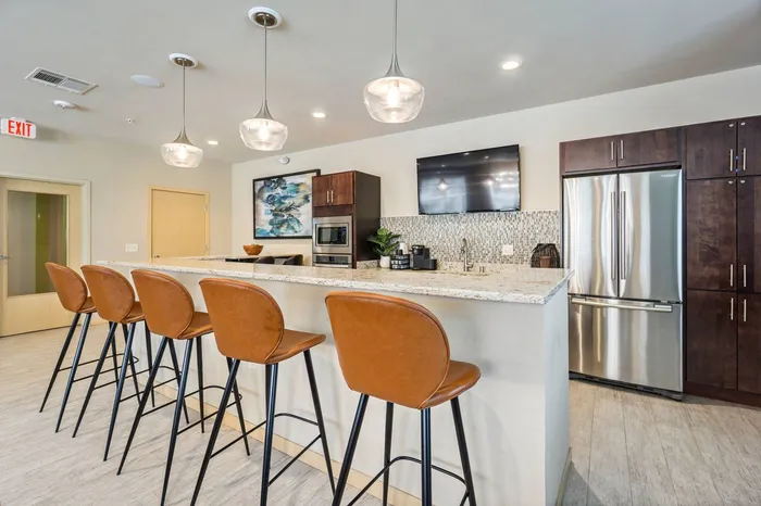 Community clubhouse at Elan Apartments in Fitchburg, Wisconsin featuring shared indoor amenities for residents.