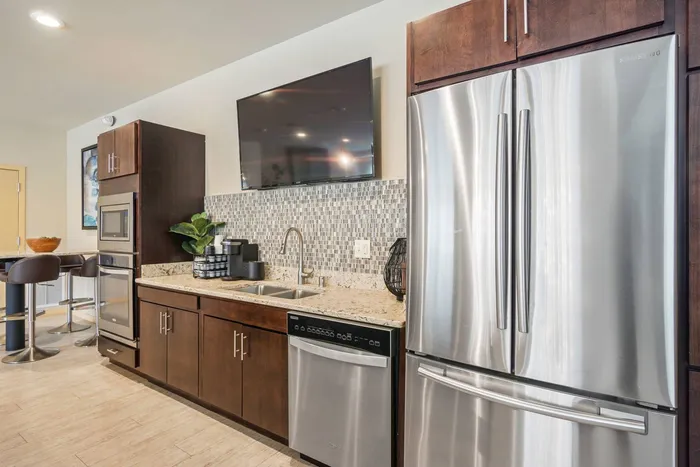 Community clubhouse at Elan Apartments in Fitchburg, Wisconsin featuring shared indoor amenities for residents.