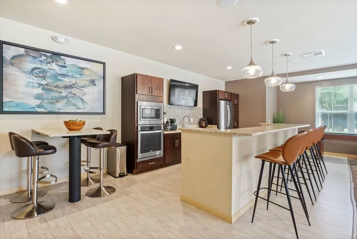 Community clubhouse at Elan Apartments in Fitchburg, Wisconsin featuring shared indoor amenities for residents.