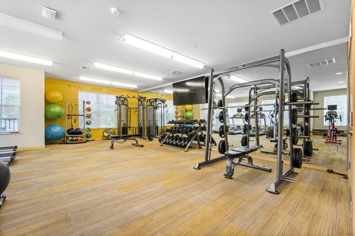 24-hour fitness center at Elan Apartments in Fitchburg, Wisconsin equipped for strength and cardio workouts.