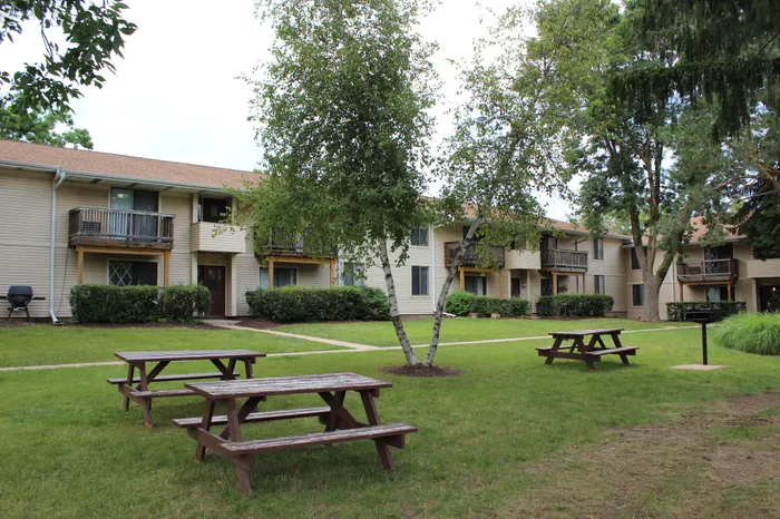 Outdoor picnic area at Arbor Lakes Apartments in Middleton, Wisconsin, available for resident use.