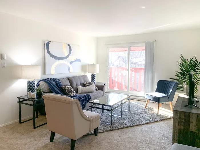 Living room at Ridge View Apartments in St. Francis, Wisconsin with comfortable layouts and natural light.