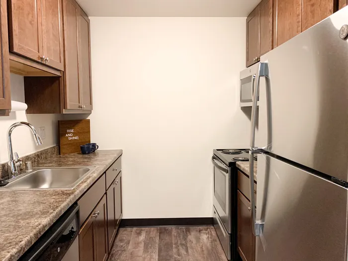 Kitchen at Ridge View Apartments in St. Francis, Wisconsin featuring functional layouts and ample storage.