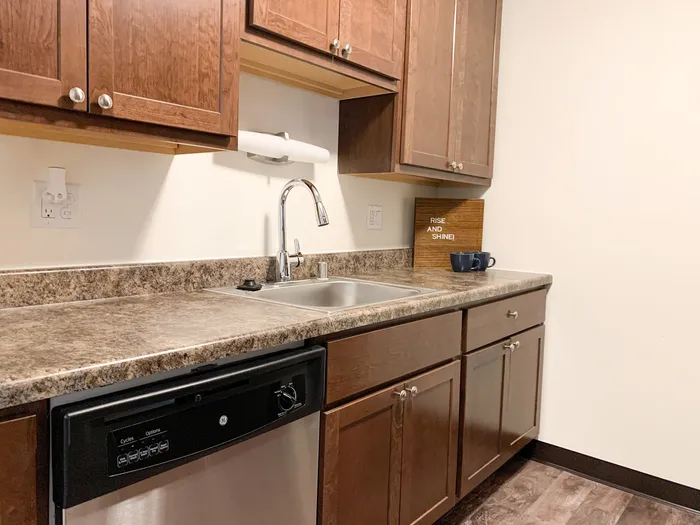 Kitchen at Ridge View Apartments in St. Francis, Wisconsin featuring functional layouts and ample storage.