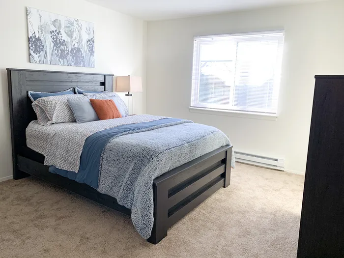 Bedroom at Ridge View Apartments in St. Francis, Wisconsin designed for comfort and relaxation.