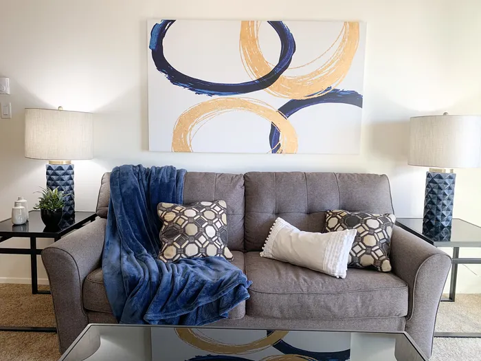 Living room at Ridge View Apartments in St. Francis, Wisconsin with comfortable layouts and natural light.