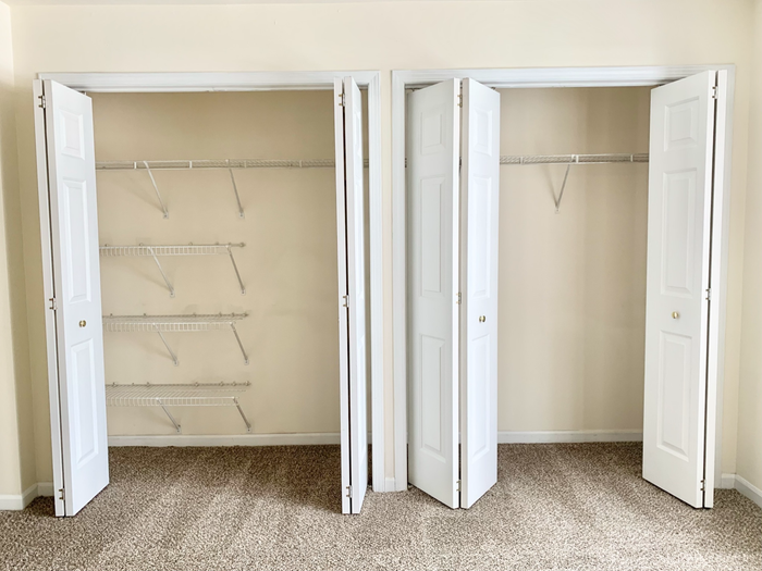 Bedroom closets at Barrington Place Apartments in Madison, Wisconsin offering ample storage space.
