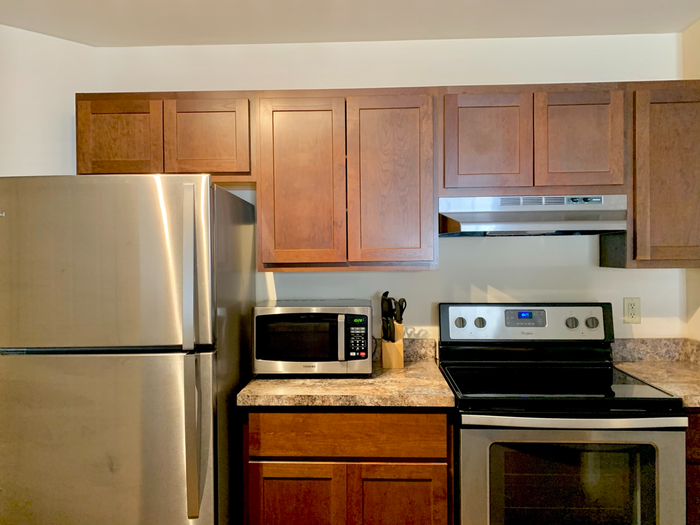 Modern apartment kitchen at Barrington Place Apartments in Madison, Wisconsin with spacious layouts and functional design.