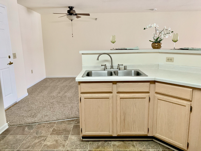 Modern apartment kitchen at Barrington Place Apartments in Madison, Wisconsin with spacious layouts and functional design.