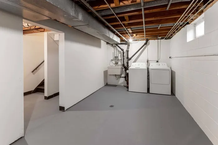 Basement area at Stone Point Apartments providing additional usable space.