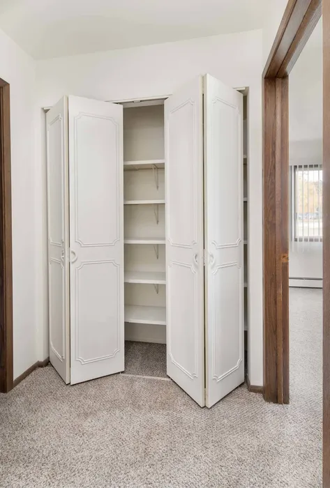 Closet space at Stone Point Apartments designed for convenient storage.