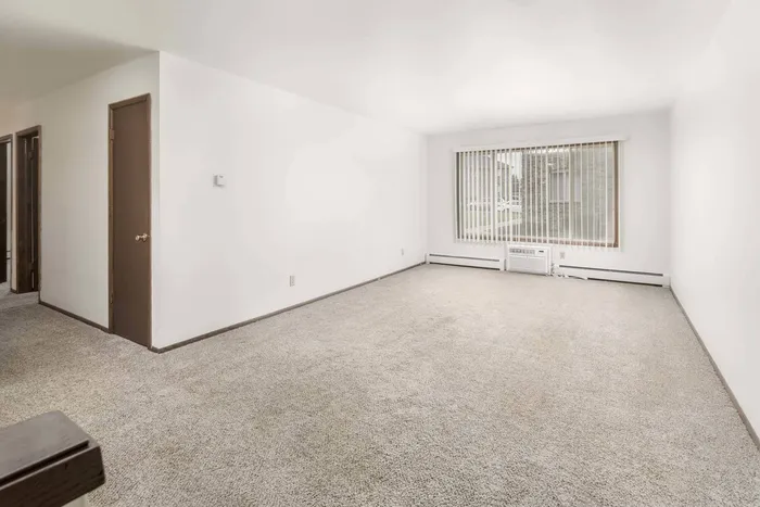 Living room at Stone Point Apartments with open layout and natural light.