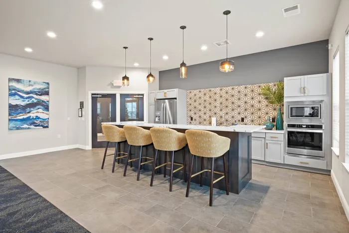 Clubroom at The 85 at Maple Grove offering gathering space and indoor amenities in Madison, Wisconsin.