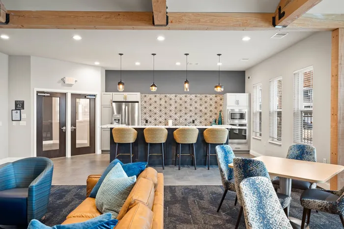 Clubroom at The 85 at Maple Grove offering gathering space and indoor amenities in Madison, Wisconsin.