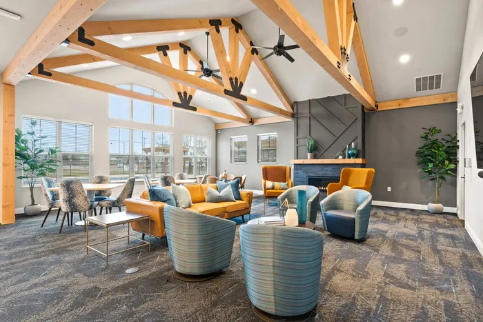 Clubroom at The 85 at Maple Grove offering gathering space and indoor amenities in Madison, Wisconsin.