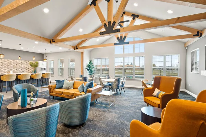 Clubroom at The 85 at Maple Grove offering gathering space and indoor amenities in Madison, Wisconsin.