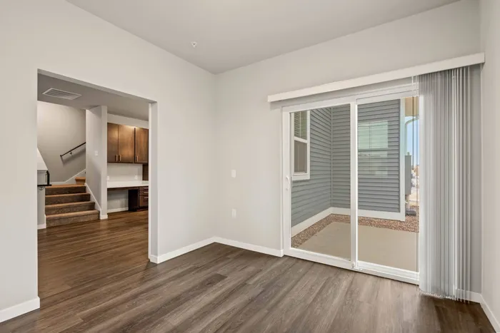 Townhome living room at The 85 at Maple Grove with open-concept layout in Madison, Wisconsin.