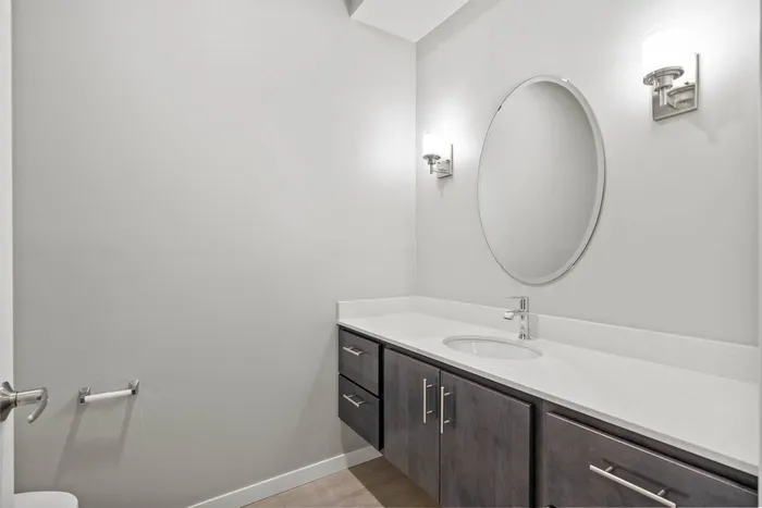 Townhome bathroom at The 85 at Maple Grove with clean finishes and practical layout in Madison, Wisconsin.