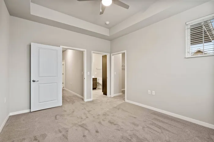 Townhome bedroom at The 85 at Maple Grove offering private and comfortable space in Madison, Wisconsin.