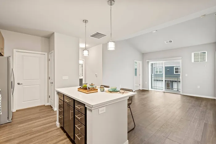 Stacked flats kitchen at The 85 at Maple Grove featuring modern finishes and efficient layout in Madison, Wisconsin.