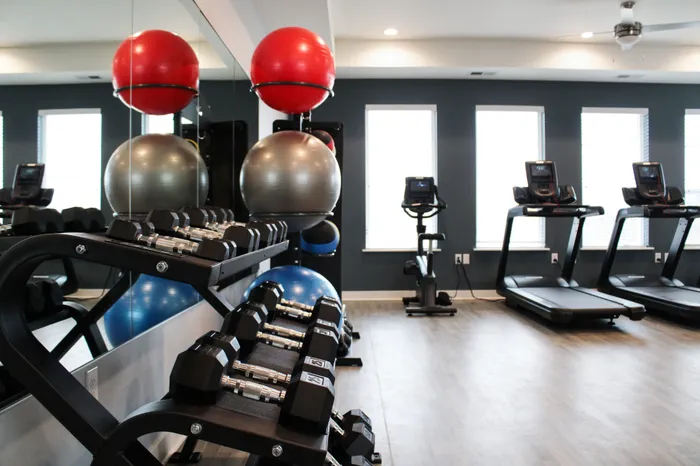 24-hour fitness center at High Bluff at Creekwood Crossing in Menomonee Falls, Wisconsin, available for resident use.