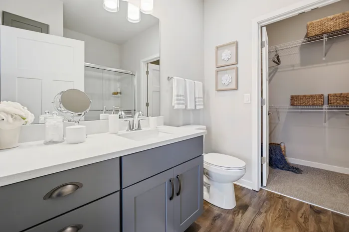 Bathroom at Seasons at North Aurora Apartments in North Aurora, Illinois featuring updated fixtures and finishes.
