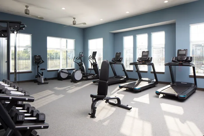 Fitness center at Seasons at Franklin Apartments in Franklin, Wisconsin equipped for daily workouts and active lifestyles.