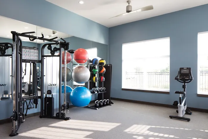 Fitness center at Seasons at Franklin Apartments in Franklin, Wisconsin equipped for daily workouts and active lifestyles.