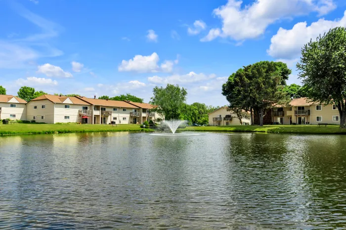 Private pond at Arbor Lakes Apartments in Middleton, Wisconsin, providing a scenic outdoor feature within the community.