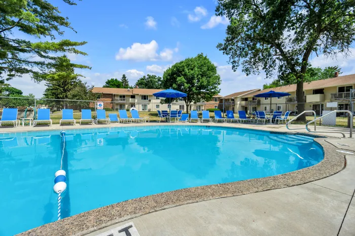 Outdoor swimming pool at Arbor Lakes Apartments in Middleton, Wisconsin, available for resident use.