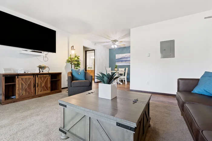 Open living area within an Arbor Lakes apartment in Middleton, Wisconsin.