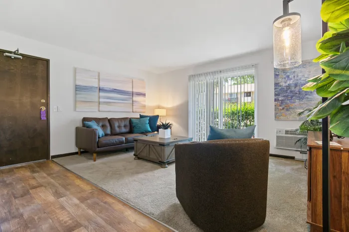 Open living area within an Arbor Lakes apartment in Middleton, Wisconsin.