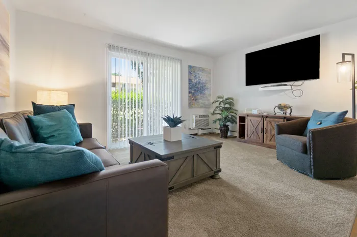 Open living area within an Arbor Lakes apartment in Middleton, Wisconsin.