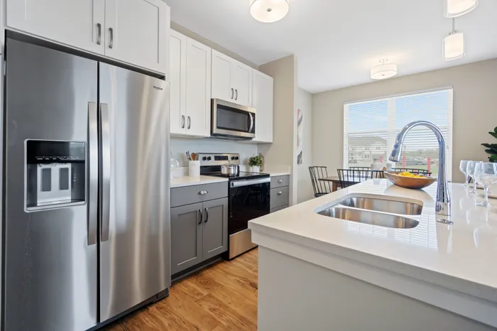 Seasons at River View Apartments in Pleasant Prairie, Wisconsin. Luxury, condo style, studio, 1 bedroom, 2 bedroom, and 3 bedroom apartments, with private garages and entries.