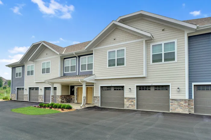 Exterior view of apartment buildings at High Bluff at Creekwood Crossing in Menomonee Falls, Wisconsin.