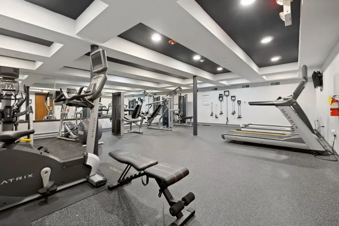Fitness center at Ridge View Apartments in St. Francis, Wisconsin equipped for resident workouts and wellness.