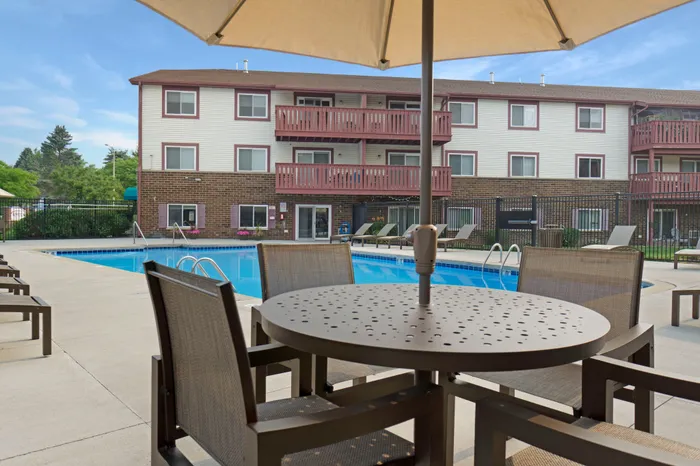 Outdoor swimming pool at Ridge View Apartments in St. Francis, Wisconsin designed for resident relaxation and recreation.