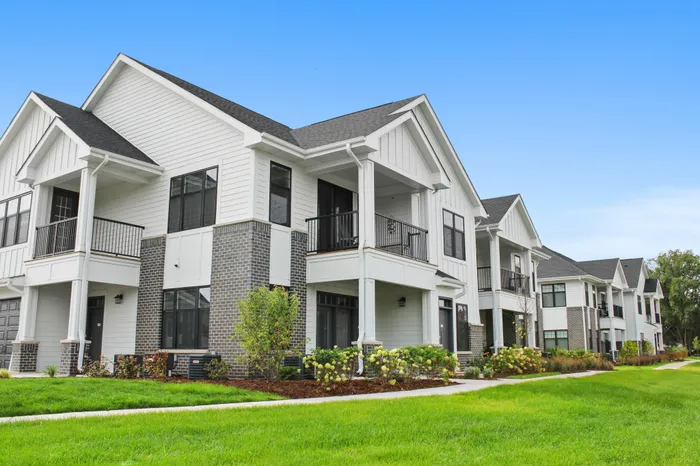 Exterior view of resident apartment buildings at Seasons at North Aurora Apartments in North Aurora, Illinois.