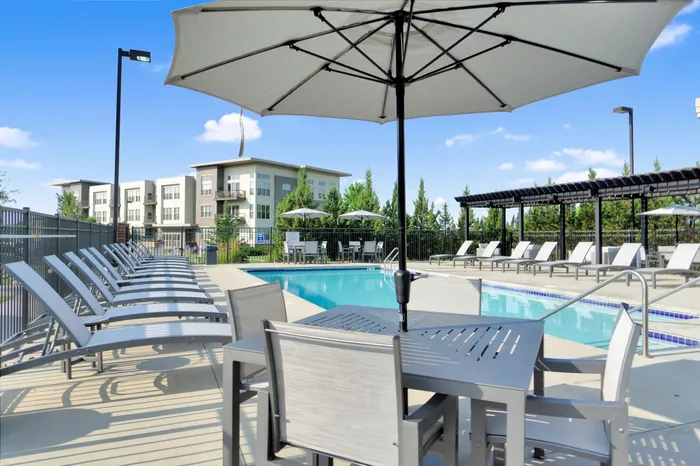 Resort-style swimming pool and sundeck at 50Twenty Apartments in Madison, Wisconsin.