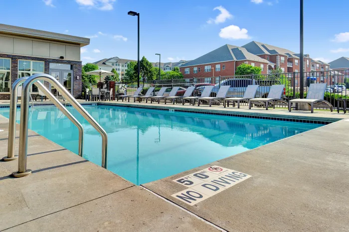Resort-style swimming pool and sundeck at 50Twenty Apartments in Madison, Wisconsin.