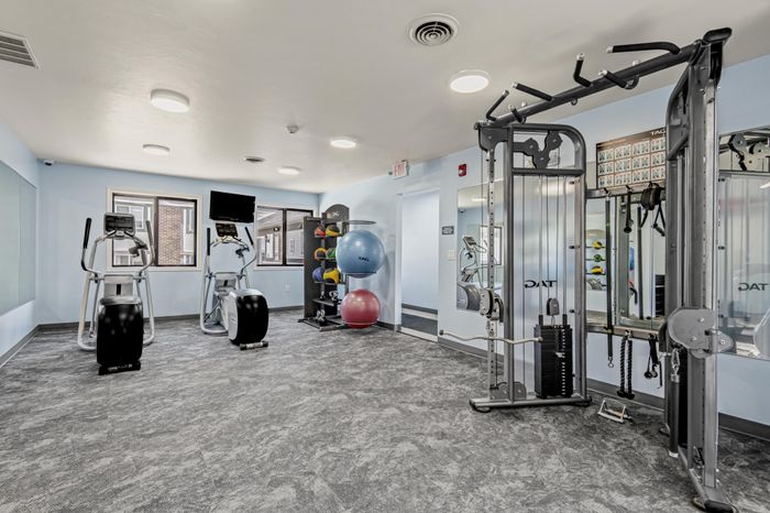 Fitness center at Creekwood Apartments in Green Bay, Wisconsin equipped for daily workouts and active living.