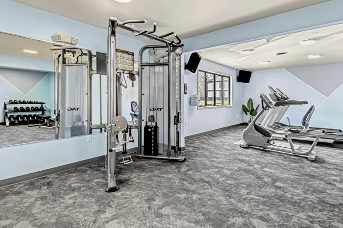 Fitness center at Creekwood Apartments in Green Bay, Wisconsin equipped for daily workouts and active living.