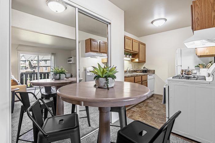 Apartment kitchen at Creekwood Apartments in Green Bay, Wisconsin featuring spacious layouts and functional design.