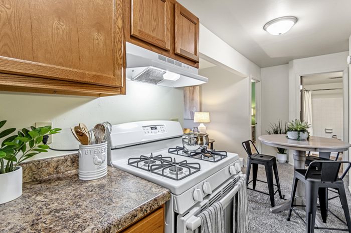 Apartment kitchen at Creekwood Apartments in Green Bay, Wisconsin featuring spacious layouts and functional design.