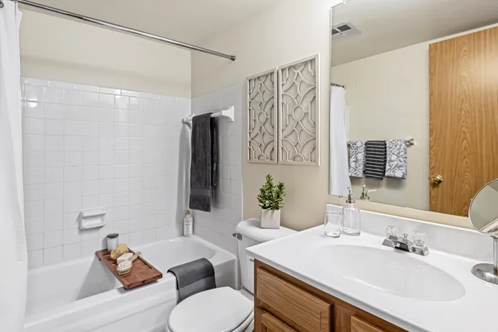Bathroom at Creekwood Apartments in Green Bay, Wisconsin with clean finishes and functional layout.