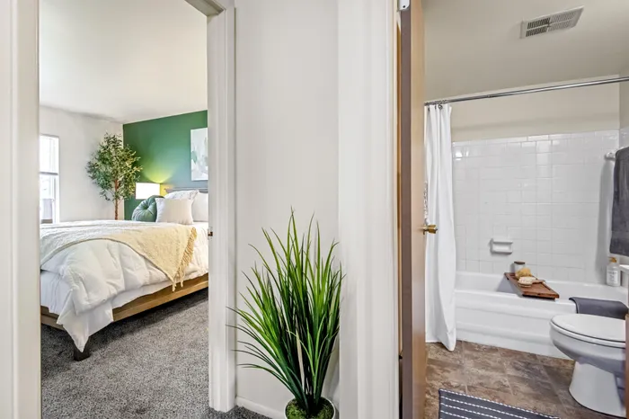 Interior hallway at Creekwood Apartments in Green Bay, Wisconsin connecting apartment living spaces.