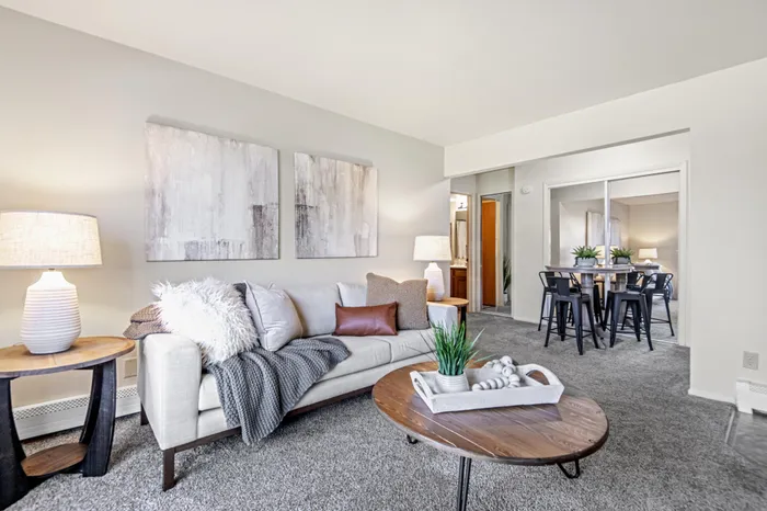 Living room at Creekwood Apartments in Green Bay, Wisconsin with open layouts and comfortable living space.