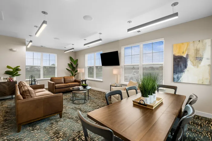 Clubroom at High Bluff at Creekwood Crossing in Menomonee Falls, Wisconsin, offering shared indoor space for residents.