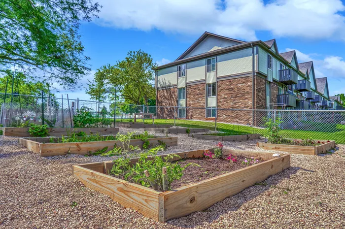 Community garden at Creekwood Apartments in Green Bay, Wisconsin providing shared outdoor green space for residents.
